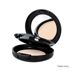 Load image into Gallery viewer, An open black makeup compact showing a pressed powder in a light ivory shade, with a mirror on the inside of the lid. The text 'Classic Ivory' appears in the bottom right corner on a plain white background.