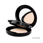Load image into Gallery viewer, An open black compact powder with a mirror on the lid, showing a light beige pressed powder. The text 'Pure Porcelain' is printed in the bottom right corner on a white background.