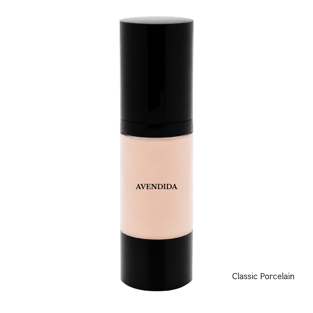 A bottle of Avendida Classic Porcelain foundation with a black cap and base and a pale peach-beige center, shown on a white background with the text 'Classic Porcelain' in the bottom right corner.