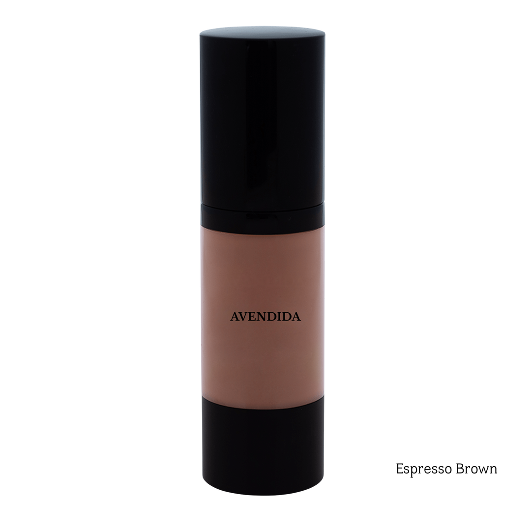 A bottle of AVENDIDA foundation in the shade Espresso Brown, featuring a black cap and base with a beige-brown liquid foundation visible in the center, set against a plain white background.