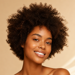 Load image into Gallery viewer, Woman with a big smile and natural hair on a beige background