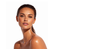 Woman with a smooth, sun-kissed complexion on a white background