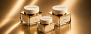 Avendida skincare products on a gold background